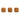 Three gingerbread cookies stamped with a gingerbread man, a house and a gingerbread woman