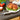 RSVP marinade injector beside a roast chicken