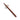 Pair of wooden chopsticks resting on the calico cat chopstick rest