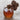 Be Home Teak and Glass Honey Jar filled with honey, the teak dipper lifted from the jar