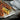 Roasted tomatoes on the OvenBond rack set inside the half sheet pan