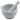 White porcelain mortar with pouring spout and pestle resting inside, on white