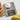 Taylor light energy kitchen scale weighing a bowl of flour next to bread and bananas