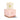 Lit Paddywax Martini ceramic candle with a martini glass motif on its pink Martini box