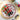 Nutcracker saucer crackers on a floral dessert plate