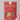 Hand holding the East End Press Christmas sewn garland in its red package