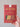 Hand holding the East End Press Christmas sewn garland in its red package