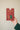 Hand holding the East End Press Festive Paper Chain Kit package
