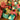 Assembled festive paper chain loops piled on a wooden table