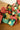 Assembled festive paper chain loops piled on a wooden table
