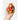 Hand holding the red sweater teddy bear shaker