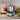 Ankarsrum Assistent Original in Forest Green on a kitchen counter with oils and herbs