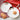 Holiday Cheer appetizer plates holding cookies on a red and white table