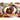 Hand-painted turkey decoration at the center of the Cosmos Gifts platter