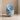 Stack of blue Cloud Cereal Bowls on a beige surface