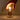 Suck UK cordless lightbulb glowing, held in hand