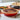 Le Creuset Heritage fluted pie dish, side view of the scalloped edge.