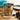 RSVP flour sifter on a wood counter with flour and blackberries