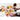 Overhead of a breakfast spread with a hand holding an egg in a hen egg cup