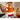 Joseph Joseph JuiceMax Plus — in use juicing orange