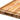 Close-up of the juice canal and hand grip on the Teakhaus edge grain carving board