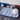 Blue Florals drying mat on a counter with glasses and a lidded dish