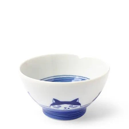 White Miya rice bowl with blue cat faces around the inside rim