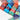 Folded Gotta checkered umbrellas showing their colored ring pulls