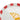 Close-up of the embossed croissant and red stripes on the plate