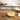 Ball whisk in use with cream lifestyle