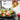 Gefu X-Plosion Dispenser pouring olive oil over a fresh salad