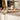 Person rolling dough on a kitchen counter with the PrecisionPin