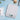 White Taylor scale on a floured blue counter