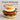 Egg rings frying eggs on a pan