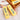 Butter-stick squishy toys in a wicker basket
