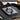 Lodge handled cast iron grill press with wooden handle for even pressing and grilling on cast iron cookware