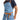 Person wearing the Cedar Blue denim Essential apron, tied at the waist
