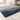 Blue gradient wave bath mat in bathroom