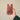 Hand holding the Christmas gift tags package