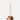 Hedgehog candle holder with a lit taper candle