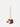 Hedgehog candle holder with a lit taper candle