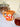 Teddy mug on a marble counter next to a cookie jar and a honey jar