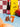 Squirrel and acorn shakers on a blue counter with pantry items