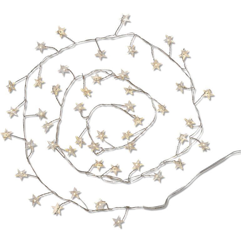 Coiled strand of small gold star lights on copper wire