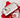 Candy cane platter holding a snowman cookie on a red holiday table