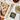 Natural Angled Turner beside an Epicurean cutting board with garlic and herbs