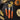 Messermeister pumpkin carving tools on a dark table with pumpkin seeds, small pumpkins and dried corn