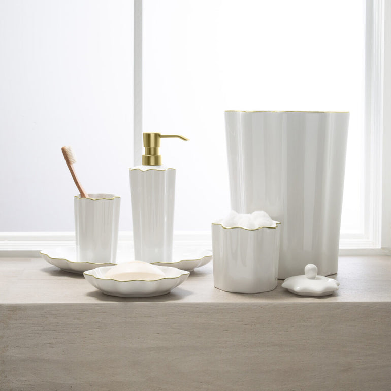 Moda Pavona bathroom collection in white porcelain with gold accents, full set lifestyle
