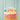 Rainbow Happy Birthday candles on cake