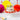 Coloured flame birthday candles on cake